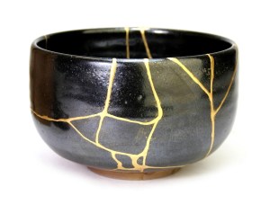 Japanese kintsugi pot that was broken and now mended together with gold