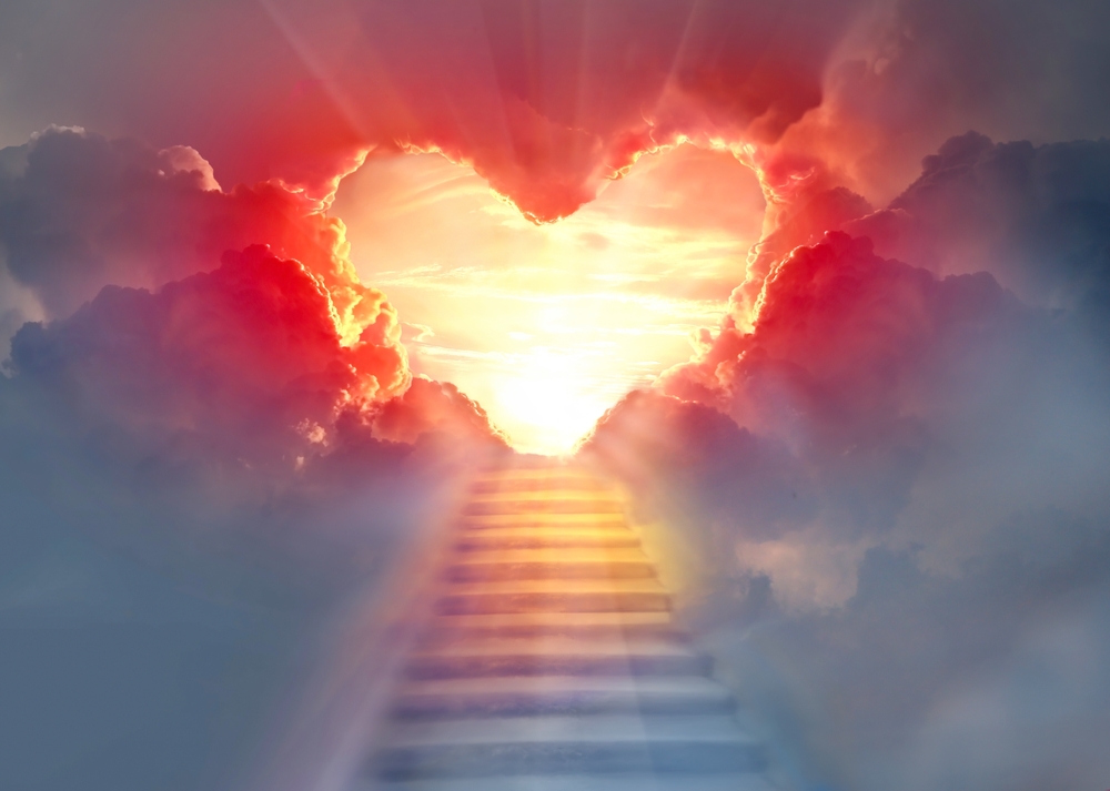 stairway up to Heaven through heart shaped clouds and light